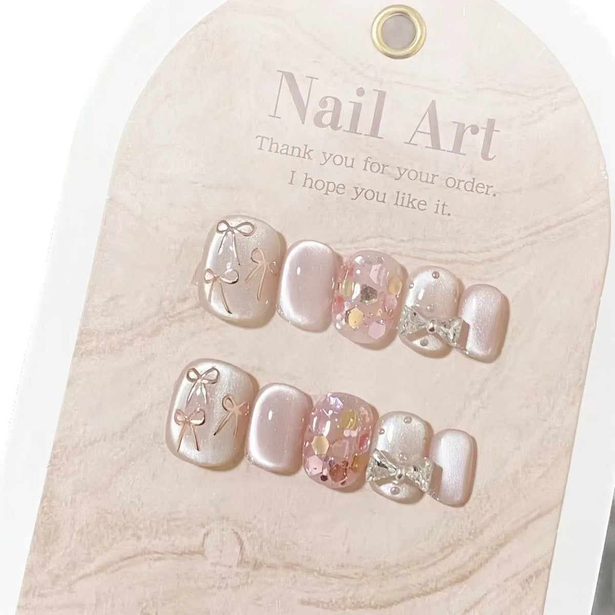 10pcs Short Handmade Nails with Sparkling Cat's Eye Hand-painted Bow in Nude Pink To Brighten Your Complexion Press-on Nail Tips
