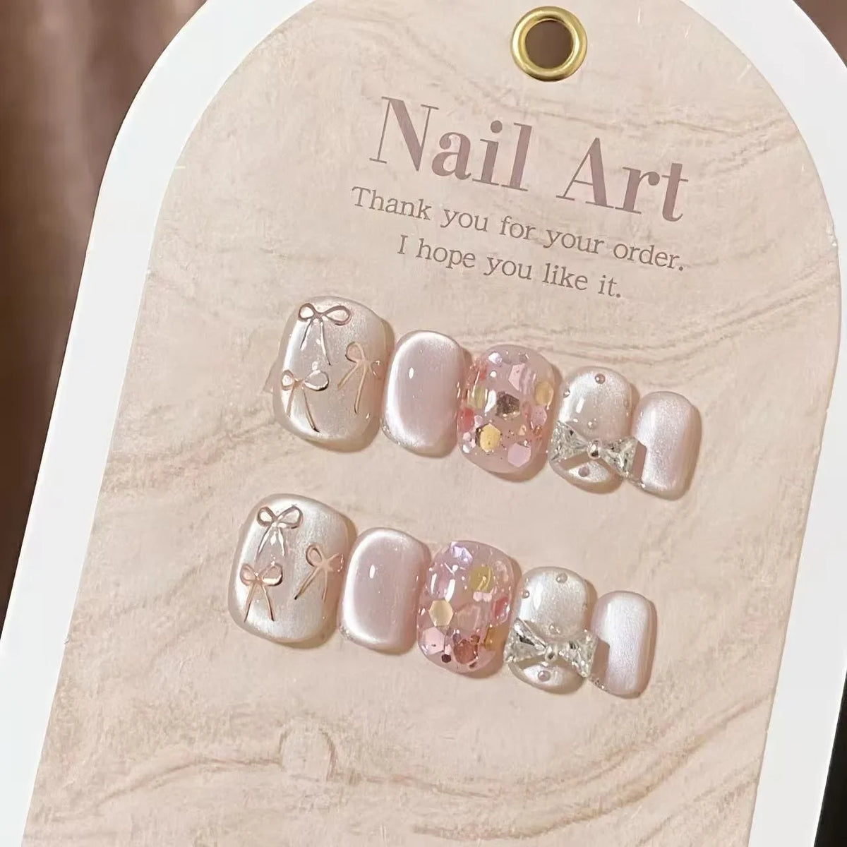 10pcs Short Handmade Nails with Sparkling Cat's Eye Hand-painted Bow in Nude Pink To Brighten Your Complexion Press-on Nail Tips